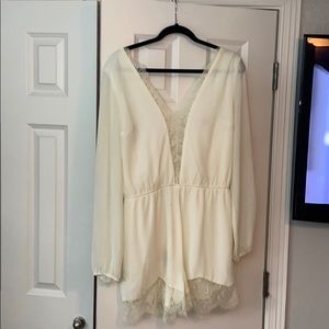 long sleeve nude romper. very beautiful